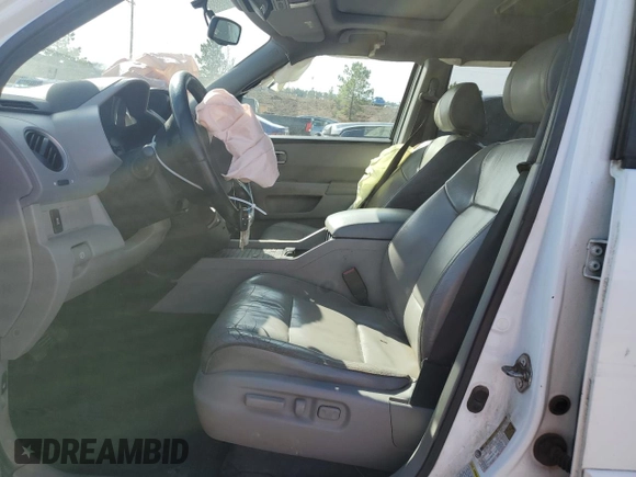 2012 Honda Pilot EX-L with VIN 5FNYF4H67CB029972, listed as a Copart auction lot 45150375 with 212,534 mi miles and Salvage Title. Bid and sale history available at DreamBid. Image 7.
