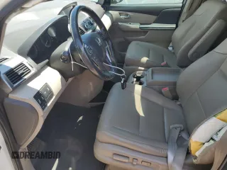 2017 Honda Odyssey Touring with VIN 5FNRL5H94HB007979, listed as a Copart auction lot 56755435 with 125,821 mi miles and Salvage title. Bid and sale history available at DreamBid. Image 7.
