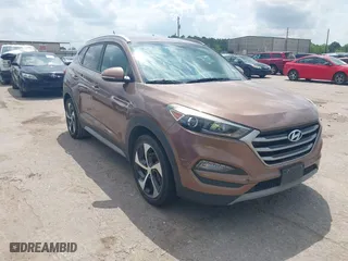 2017 Hyundai Tucson Value with VIN KM8J33A27HU430198, listed as a IAAI auction lot 42104369 with 163,929 mi miles. Bid and sale history available at carsss.com. Image 1.