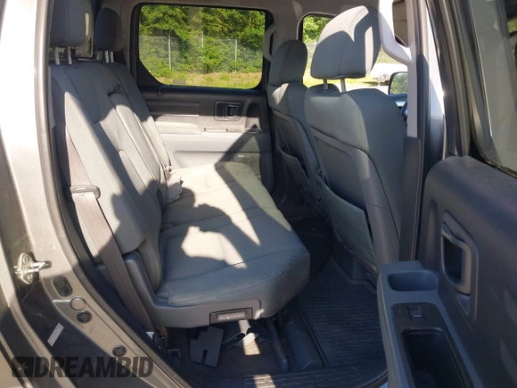 2008 Honda Ridgeline RT with VIN 2HJYK16238H501799, listed as a IAAI auction lot 42552024 with 152,119 mi miles and . Bid and sale history available at DreamBid. Image 8.
