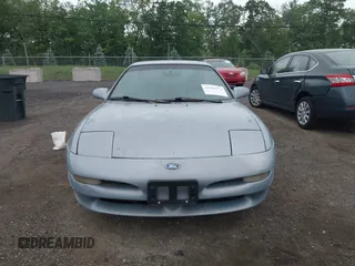 1995 Ford Probe z VIN 1ZVLT20A6S5154983, wystawiony jako IAAI lot #42301574 z przebiegiem 128 515 mil mil oraz . Historia ofert i sprzedaży dostępna na DreamBid. Obrazek 6.