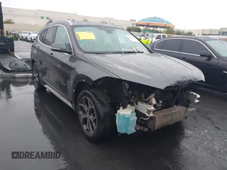 2017 BMW X1 xDrive28i with VIN WBXHT3C32H5F70152, listed as a IAAI auction lot 42184934 with 125,645 mi miles and . Bid and sale history available at DreamBid. Image 14.
