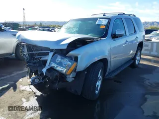 2013 Chevrolet Tahoe LT with VIN 1GNSKBE01DR157083, listed as a IAAI auction lot 41759189 with 153,403 mi miles and . Bid and sale history available at DreamBid. Image 18.