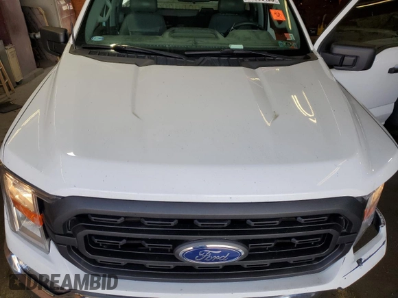 2021 Ford F-150 XL with VIN 1FTMF1EB8MKE16551, listed as a Copart auction lot 54966435 with 41,590 mi miles and Salvage title. Bid and sale history available at DreamBid. Image 11.