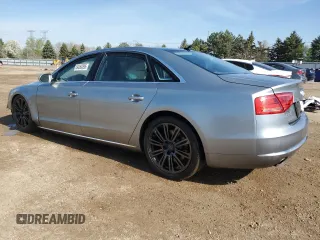 2012 Audi A8 with VIN WAURVAFD8CN018131, listed as a Copart auction lot 54260395 with 98,706 mi miles and Salvage title. Bid and sale history available at DreamBid. Image 2.