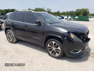 2019 Jeep Cherokee z VIN 1C4PJLJN0KD215834, wystawiony jako Copart lot #57652975 z przebiegiem 127 986 mil mil oraz Czysty tytuł • Clean title. Historia ofert i sprzedaży dostępna na DreamBid. Obrazek 4.