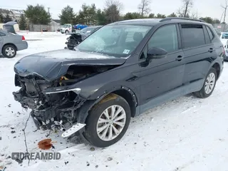 2020 Volkswagen Tiguan S with VIN 3VV0B7AXXLM080652, listed as a IAAI auction lot 41379678 with 46,330 mi miles and . Bid and sale history available at DreamBid. Image 20.