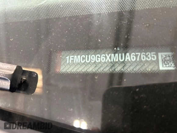 2021 Ford Escape SE z VIN 1FMCU9G6XMUA67635, wystawiony jako IAAI lot #42581187 z przebiegiem 89 704 mil mil oraz . Historia ofert i sprzedaży dostępna na DreamBid. Obrazek 1.