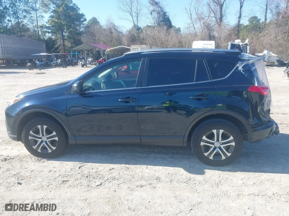 2017 Toyota RAV4 LE with VIN JTMZFREV9HJ719316, listed as a IAAI auction lot 41497253 with 98,357 mi miles. Bid and sale history available at carsss.com. Image 14.