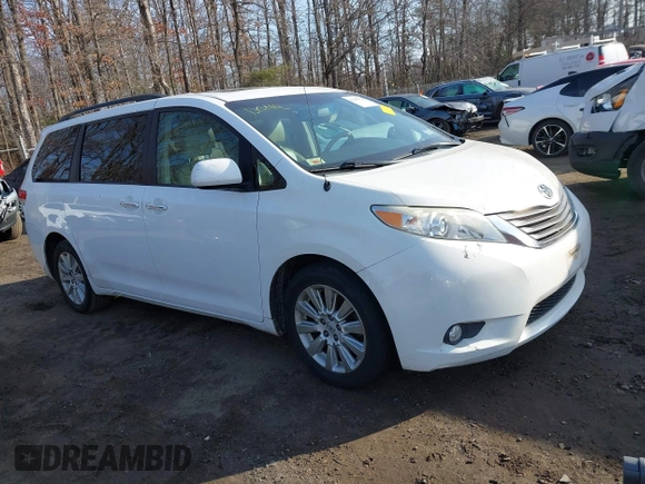 2014 Toyota Sienna Ltd with VIN 5TDDK3DC9ES081022, listed as a IAAI auction lot 41183921 with 1 mi miles. Bid and sale history available at carsss.com. Image 1.