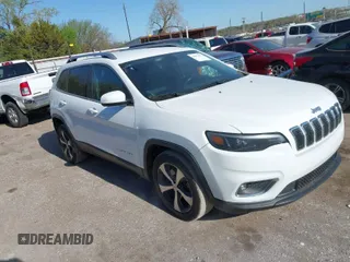 2019 Jeep Cherokee Limited with VIN 1C4PJLDB9KD433627, listed as a IAAI auction lot 42012334 with 122,147 mi miles. Bid and sale history available at carsss.com. Image 1.