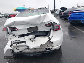 2020 Tesla Model 3 Standard Range Plus with VIN 5YJ3E1EA2LF740225, listed as a IAAI auction lot 41781554 with 46,703 mi miles. Bid and sale history available at carsss.com. Image 15.