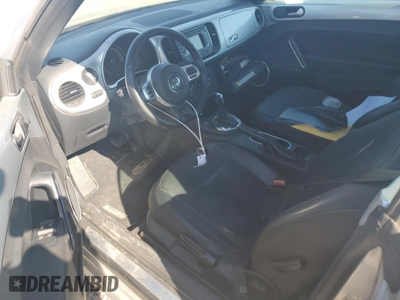 2013 Volkswagen Beetle 2.5L with VIN 3VW5P7ATXDM803952, listed as a Copart auction lot 76971934 with 211,449 mi miles and Salvage Title. Bid and sale history available at DreamBid. Image 8.