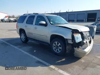 2013 GMC Yukon SLT with VIN 1GKS2CE01DR298299, listed as a IAAI auction lot 41759932 with 167,283 mi miles. Bid and sale history available at carsss.com. Image 1.