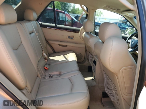 2008 Cadillac SRX RWD z VIN 1GYEE637780164161, wystawiony jako Copart lot #59238545 z przebiegiem 93 717 mil mil oraz Czysty tytuł • Clean title. Historia ofert i sprzedaży dostępna na DreamBid. Obrazek 11.