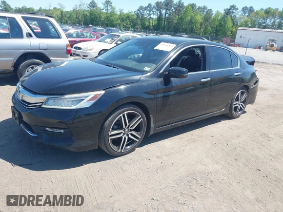 2016 Honda Accord Touring with VIN 1HGCR3F93GA036152, listed as a IAAI auction lot 42134354 with 233,311 mi miles and . Bid and sale history available at DreamBid. Image 2.