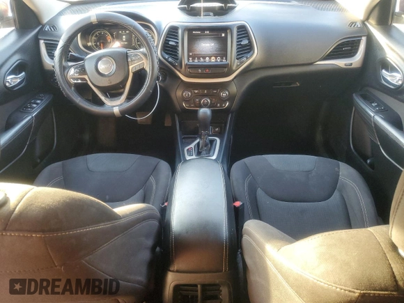 2016 Jeep Cherokee Latitude with VIN 1C4PJLCBXGW221848, listed as a Copart auction lot 51090945 with 216,945 mi miles and Salvage title. Bid and sale history available at DreamBid. Image 8.