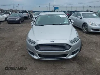 2016 Ford Fusion Titanium with VIN 3FA6P0K93GR117587, listed as a IAAI auction lot 42079701 with 142,105 mi miles. Bid and sale history available at carsss.com. Image 12.