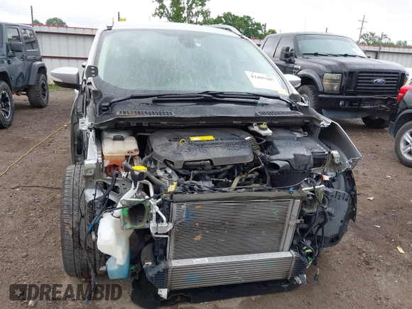 2015 Ford Escape Titanium with VIN 1FMCU0JX7FUB60418, listed as a IAAI auction lot 42485107 with 82,172 mi miles and . Bid and sale history available at DreamBid. Image 12.