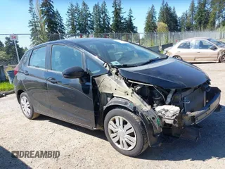 2015 Honda Fit LX with VIN 3HGGK5H58FM765907, listed as a IAAI auction lot 42061158 with 120,178 mi miles. Bid and sale history available at carsss.com. Image 1.