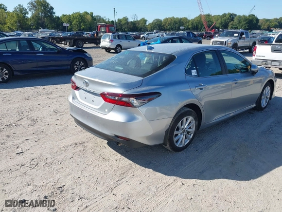 2024 Toyota Camry LE with VIN 4T1C11AK4RU194873, listed as a IAAI auction lot 40269603 with 5,619 mi miles. Bid and sale history available at carsss.com. Image 4.