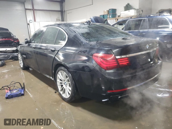 2013 BMW 7 Series 740i with VIN WBAYA6C51DC995111, listed as a Copart auction lot 87131184 with 94,535 mi miles and Salvage Title. Bid and sale history available at carsss.com. Image 2.