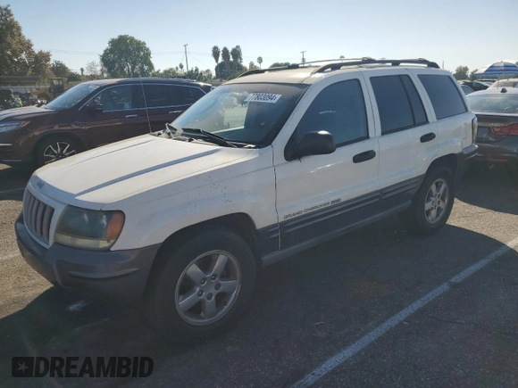 2004 Jeep Grand Cherokee with VIN 1J4GX48JX4C301369, listed as a Copart auction lot 77803094 with 179,404 mi miles and Clean title. Bid and sale history available at DreamBid. Image 1.