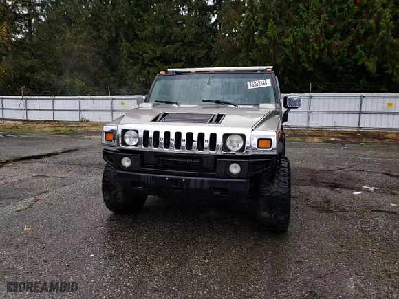 2003 Hummer H2 with VIN 5GRGN23U73H111109, listed as a Copart auction lot 76388144 with 160,179 mi miles and Salvage Title. Bid and sale history available at carsss.com. Image 11.
