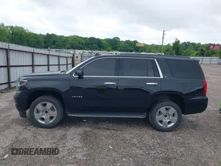 2017 Chevrolet Tahoe LT with VIN 1GNSCBKCXHR342170, listed as a IAAI auction lot 42137766 with 76,854 mi miles and . Bid and sale history available at DreamBid. Image 14.