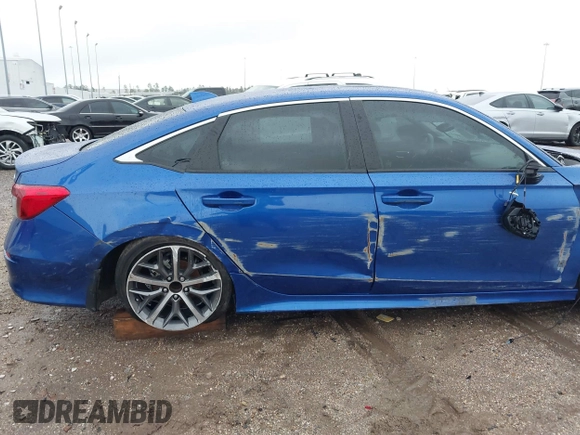 2023 Honda Civic Touring z VIN 2HGFE1F92PH317695, wystawiony jako IAAI lot #41556915 z przebiegiem 20 421 mil mil oraz . Historia ofert i sprzedaży dostępna na DreamBid. Obrazek 22.