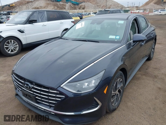 2021 Hyundai Sonata Hybrid Blue with VIN KMHL24JJXMA035579, listed as a IAAI auction lot 41688249 with 31,726 mi miles. Bid and sale history available at carsss.com. Image 2.
