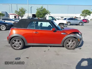 2012 MINI Convertible with VIN WMWZN3C54CT134124, listed as a IAAI auction lot 42313148 with 119,963 mi miles and . Bid and sale history available at DreamBid. Image 14.