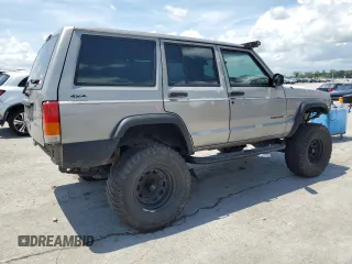 2000 Jeep Cherokee SE with VIN 1J4FF28SXYL140930, listed as a Copart auction lot 59191035 with 248,598 mi miles and Salvage title. Bid and sale history available at DreamBid. Image 3.