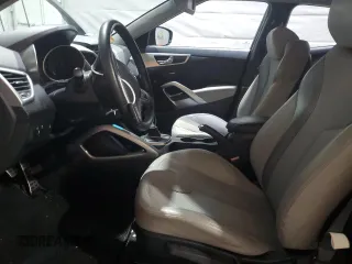 2012 Hyundai Veloster w/Gray Int z VIN KMHTC6AD8CU021518, wystawiony jako Copart lot #55635095 z przebiegiem 90 011 mil mil oraz Czysty tytuł • Clean title. Historia ofert i sprzedaży dostępna na DreamBid. Obrazek 7.