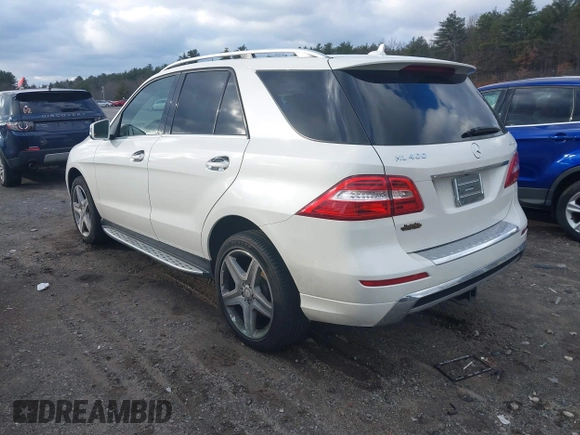 2015 Mercedes-Benz M 400 with VIN 4JGDA5GB3FA534787, listed as a IAAI auction lot 41084917 with 116,325 mi miles and . Bid and sale history available at DreamBid. Image 3.