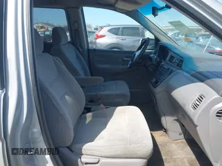 2002 Honda Odyssey LX z VIN 2HKRL18532H567409, wystawiony jako IAAI lot #42069502 z przebiegiem 173 662 mil mil oraz . Historia ofert i sprzedaży dostępna na DreamBid. Obrazek 5.