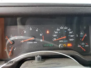 2002 Jeep Wrangler X z VIN 1J4FA39S32P767598, wystawiony jako Copart lot #55974555 z przebiegiem 177 793 mil mil oraz Czysty tytuł • Clean title. Historia ofert i sprzedaży dostępna na DreamBid. Obrazek 9.