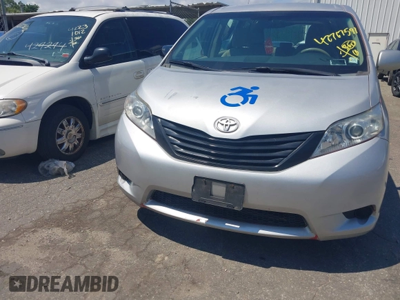 2014 Toyota Sienna L with VIN 5TDZK3DC9ES518653, listed as a IAAI auction lot 42767591 with 261,730 mi miles and . Bid and sale history available at DreamBid. Image 6.