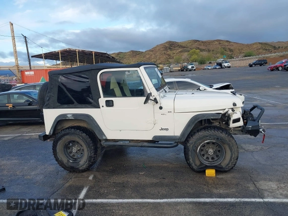 2001 Jeep Wrangler Sport with VIN 1J4FA49S41P308407, listed as a IAAI auction lot 41772240 with 139,461 mi miles. Bid and sale history available at carsss.com. Image 13.