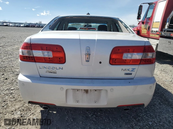 2009 Lincoln MKZ z VIN 3LNHM28T39R629987, wystawiony jako Copart lot #50097385 z przebiegiem 132 144 mil mil oraz Szkoda całkowita • Salvage title. Historia ofert i sprzedaży dostępna na DreamBid. Obrazek 6.