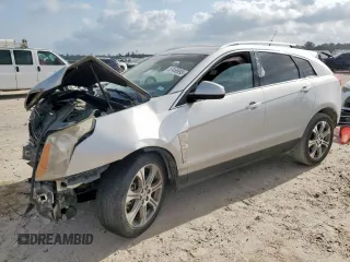 2012 Cadillac SRX Premium Collection z VIN 3GYFNCE30CS503700, wystawiony jako Copart lot #57456995 z przebiegiem 155 329 mil mil oraz Szkoda całkowita • Salvage title. Historia ofert i sprzedaży dostępna na DreamBid. Obrazek 1.