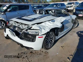2018 Audi R8 Spyder performance z VIN WUA4BCFX7J7902058, wystawiony jako IAAI lot #40861482 z przebiegiem 20 951 mil mil oraz . Historia ofert i sprzedaży dostępna na DreamBid. Obrazek 4.