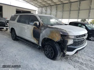 2022 Chevrolet Suburban Z71 with VIN 1GNSKDKD7NR312482, listed as a Copart auction lot 75623814 with 0 mi miles and Salvage Title. Bid and sale history available at carsss.com. Image 4.