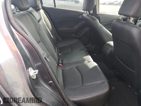 2014 Mazda 3 S Grand Touring z VIN JM1BM1W31E1142489, wystawiony jako Copart lot #43557485 z przebiegiem 158 399 mil mil oraz Szkoda całkowita • Salvage title. Historia ofert i sprzedaży dostępna na DreamBid. Obrazek 10.