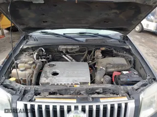 2009 Mercury Mariner Hybrid with VIN 4M2CU29319KJ18127, listed as a IAAI auction lot 41830660 with 273,438 mi miles. Bid and sale history available at carsss.com. Image 10.