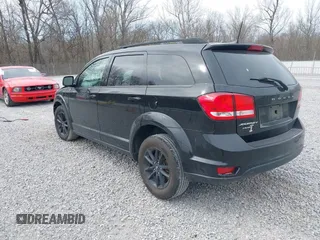 2019 Dodge Journey SE with VIN 3C4PDCBB7KT844691, listed as a IAAI auction lot 41784711 with 107,000 mi miles and . Bid and sale history available at DreamBid. Image 3.