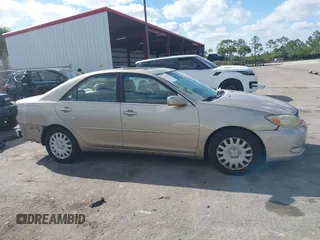 2003 Toyota Camry LE with VIN 4T1BE30K83U176834, listed as a IAAI auction lot 41307922 with 182,019 mi miles and . Bid and sale history available at DreamBid. Image 13.