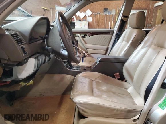 1995 Mercedes-Benz C with VIN WDBHA28E8SF115598, listed as a Copart auction lot 50145195 with 129,134 mi miles and Clean Title. Bid and sale history available at carsss.com. Image 7.