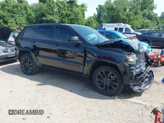 2018 Jeep Grand Cherokee Upland with VIN 1C4RJFAG2JC350975, listed as a IAAI auction lot 42612836 with 148,435 mi miles and . Bid and sale history available at DreamBid. Image 1.