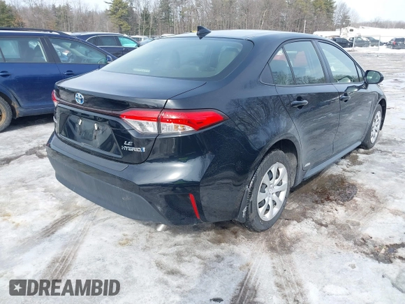 2023 Toyota Corolla Hybrid LE with VIN JTDBDMHE7P3004396, listed as a IAAI auction lot 41606222 with 15,037 mi miles. Bid and sale history available at carsss.com. Image 4.